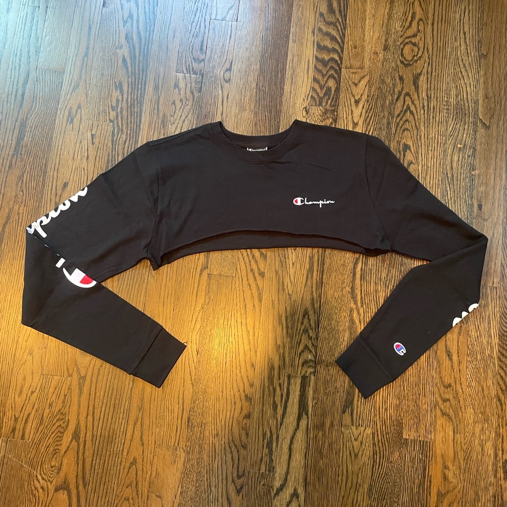 Black Champion shrug (can go with red Champion tube top), size M.